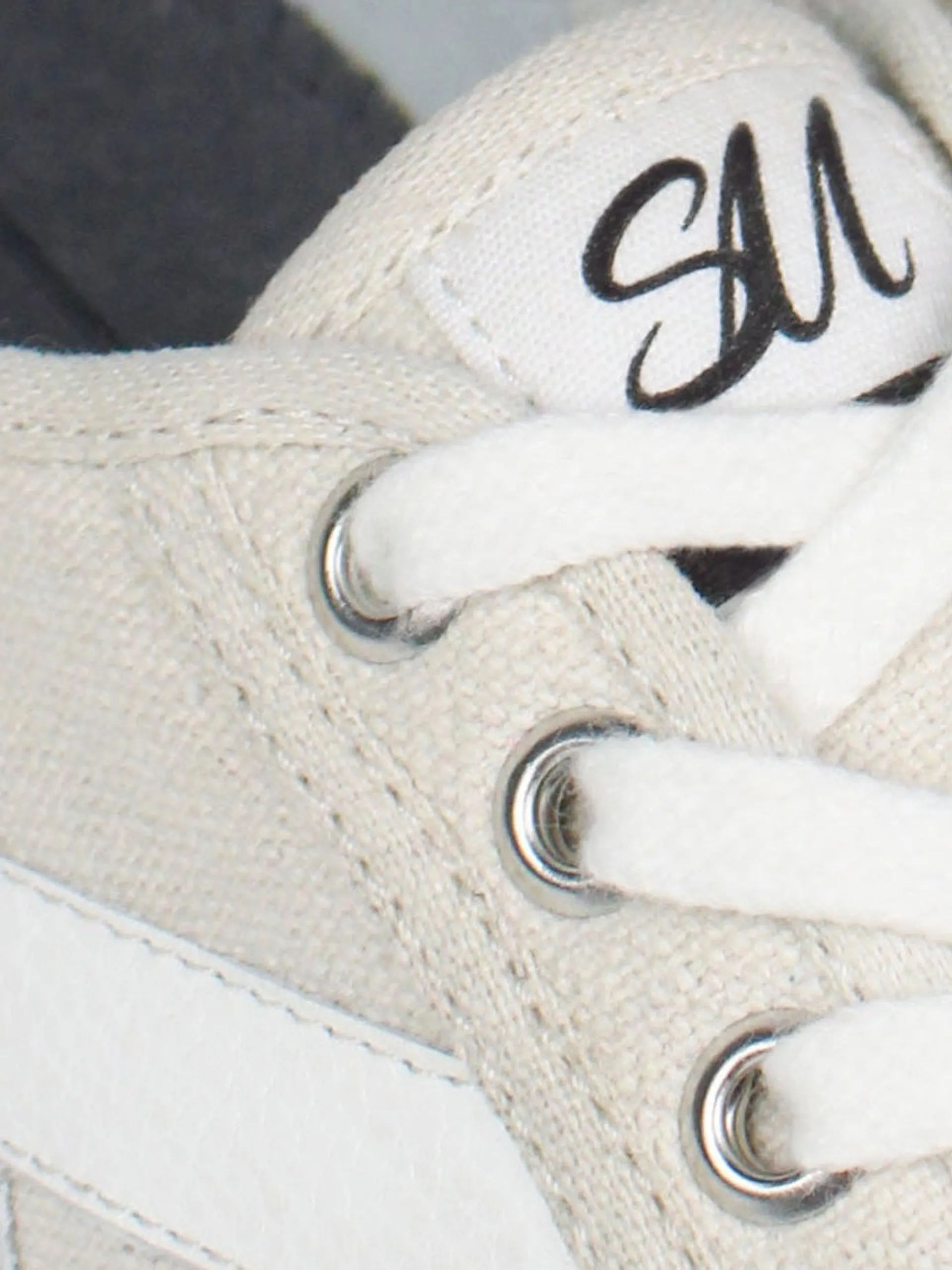 The Helios beige and white trainers
